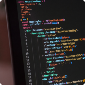 A computer screen displaying code with ARIA attributes for accessible UI components, representing accessibility remediation.